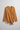 Florence Asymmetric Wrap Top in Dusty Marigold – product front view